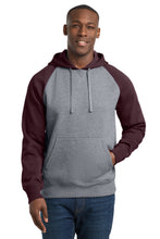 Sport-Tek?? Raglan Colorblock Pullover Hooded Sweatshirt. ST267